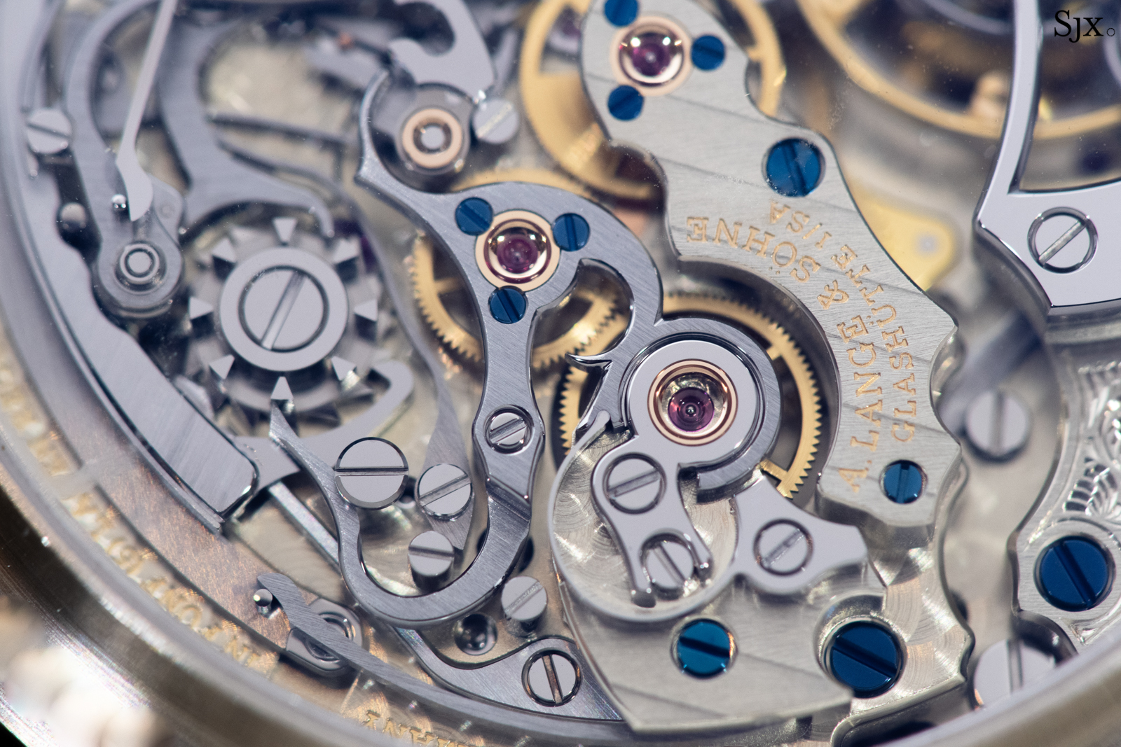 Closeup of the iconic design of the lateral clutch and column wheel. Note the redesigned chronograph bridge to accommodate the tourbillon. 